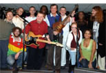 Camphill residents join headline band Zuba on the stage.